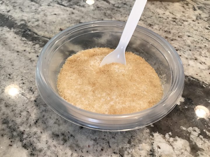 mixing sugars together for Lavender Sugar Scrub