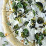 overhead shot of four cheese white broccoli pizza