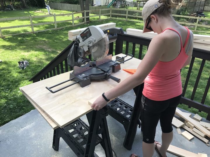 cutting wood for homemade Adirondack chairs