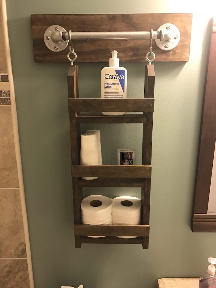 bathroom wall organizer hanging on wall
