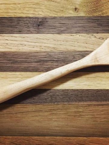 overhead shot of wooden spoon on cutting board