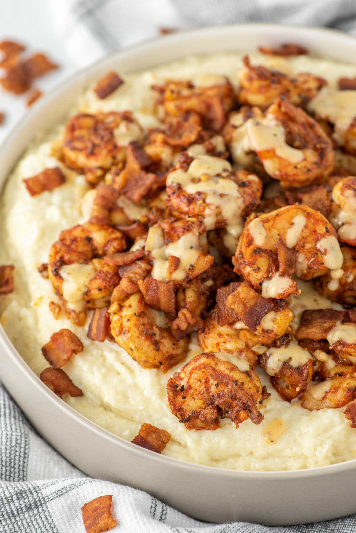 shrimp and grits in grey bowl