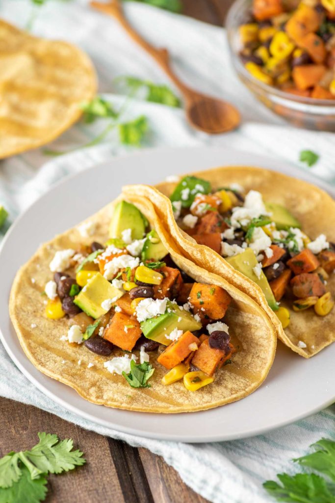 two sweet potato tacos on plate