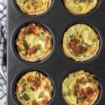 overhead shot of mini ham and cheese quiche in pan