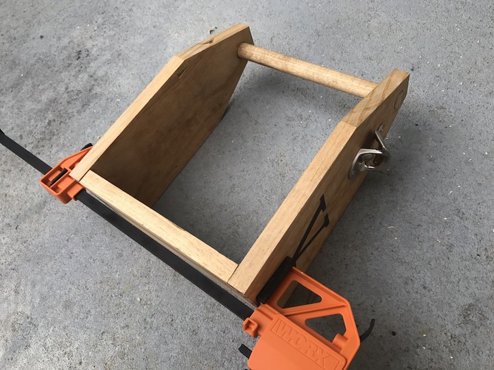 gluing together beer caddy with clamps