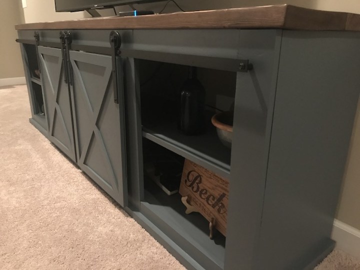 close-up side view of sliding door entertainment center