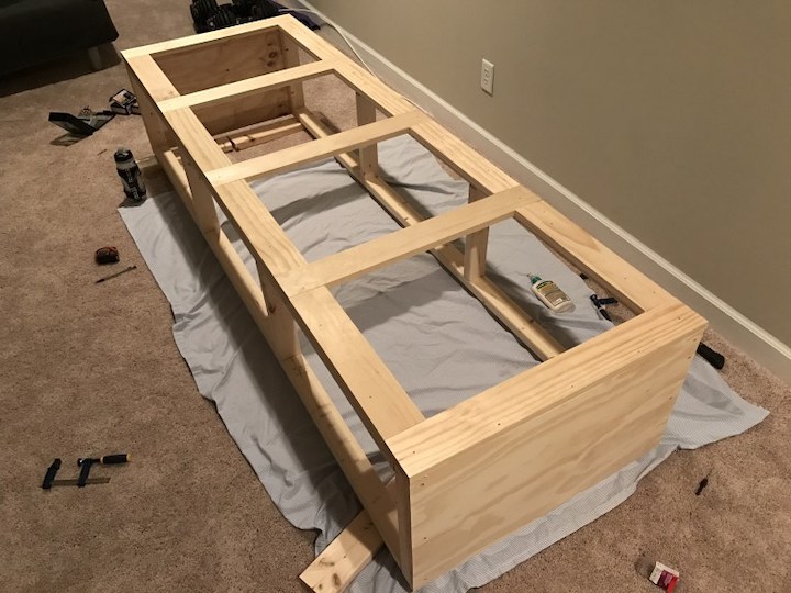 gluing and nailing face frame to entertainment center