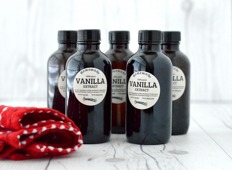 close-up of 5 bottles of homemade vanilla extract