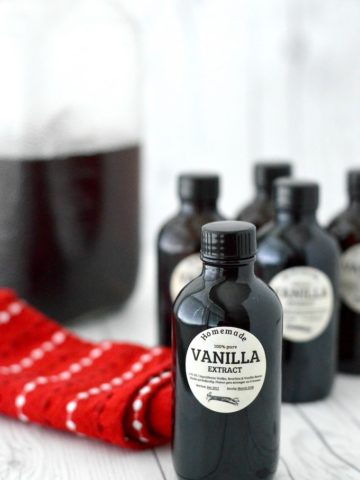 close-up of 5 bottles of homemade vanilla extract