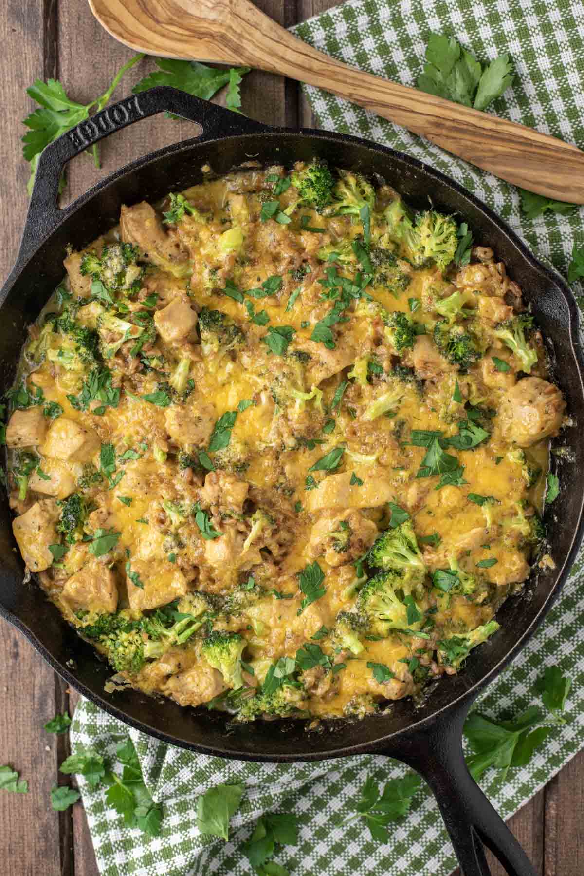 overhead shot of chicken and broccoli bake in cast iron skillet