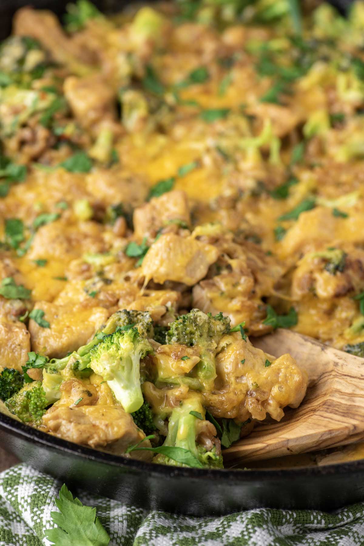 spoon dipped in chicken broccoli skillet