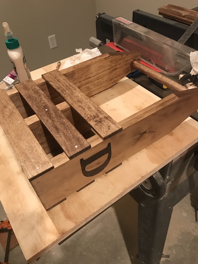 gluing and nailing side rails on wine caddy