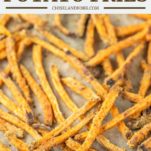 sweet potato fries on parchment-lined baking sheet