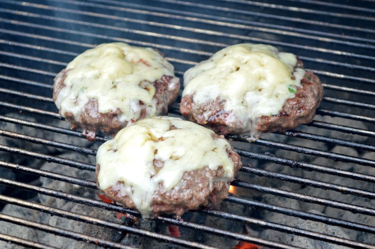 bison bacon jam burger on grill