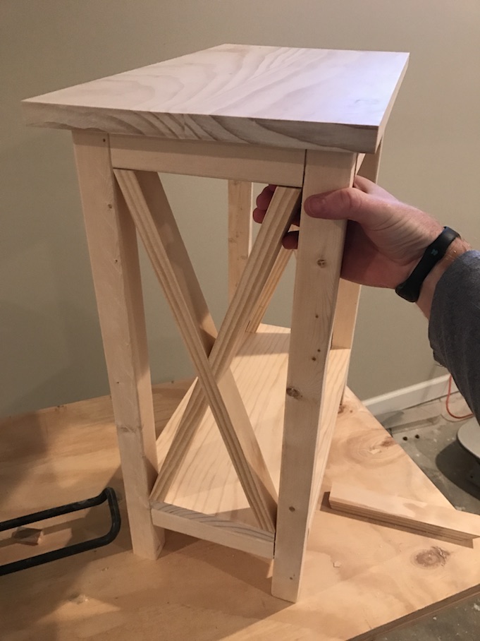 x for x side table being put together