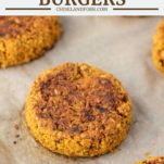 chickpea burgers on a parchment-lined baking sheet