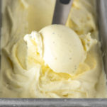 close-up of vanilla bean ice cream in metal tin