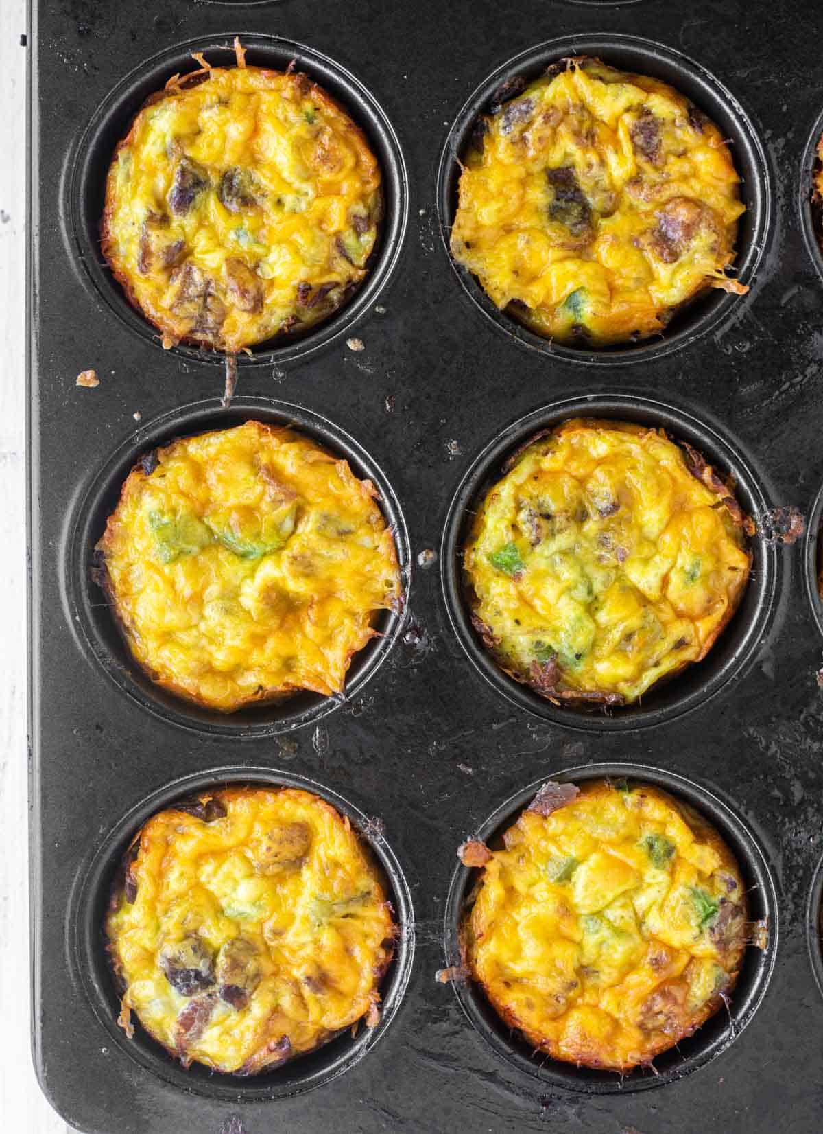overhead shot of hash brown egg muffins in pan