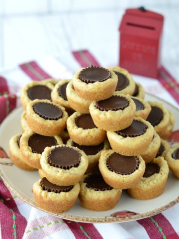 close-up of stacked peanut butter cup cookies on plate