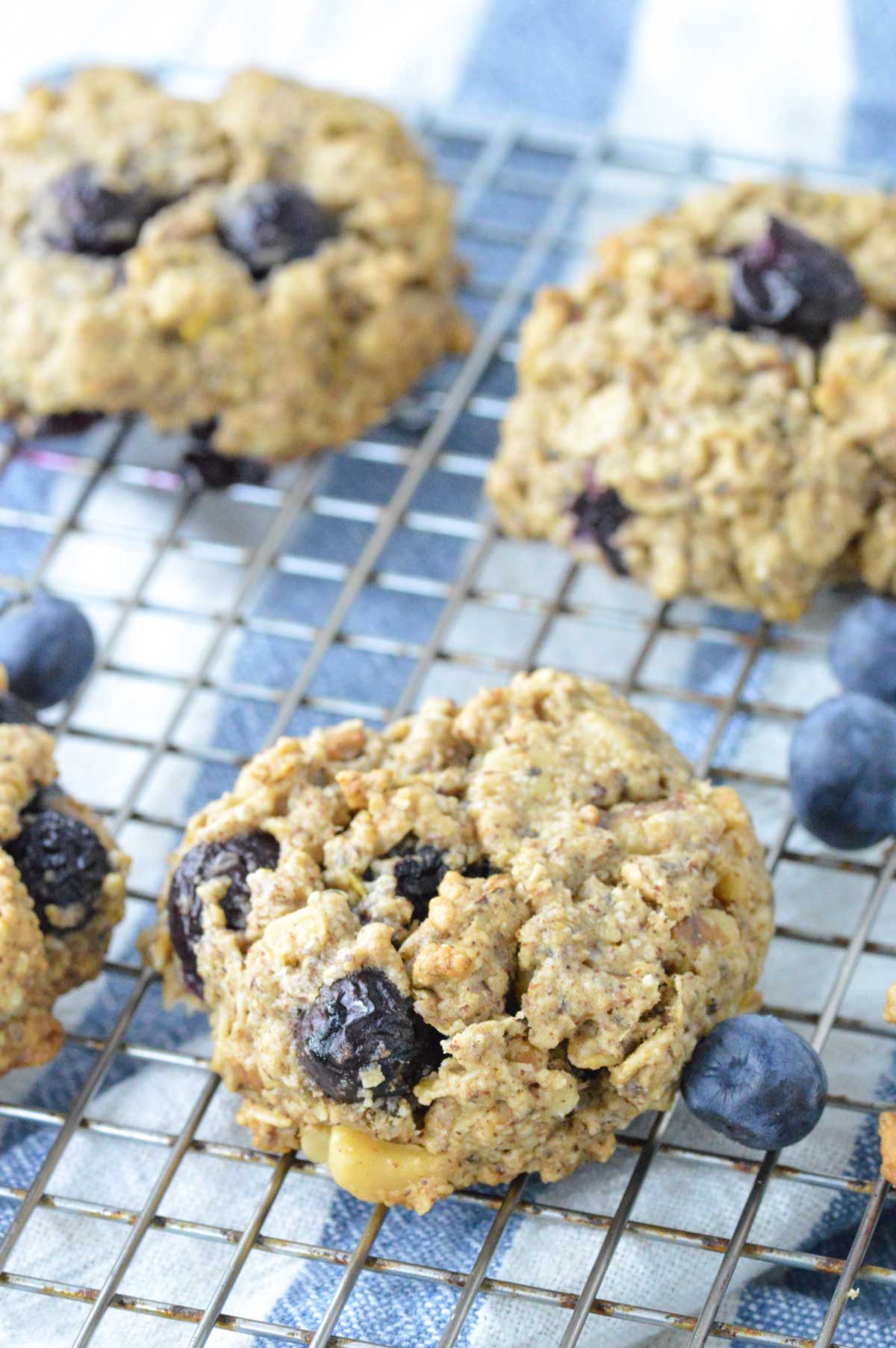close-up of lemon blueberry breakfast cookies on cooling rack