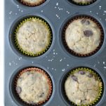 close-up of vegan banana chocolate chip muffins in muffin pan
