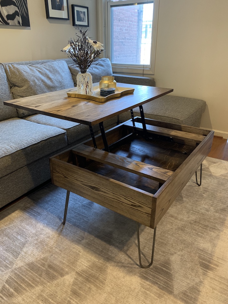 photo of DIY lift top coffee table opening up in living room