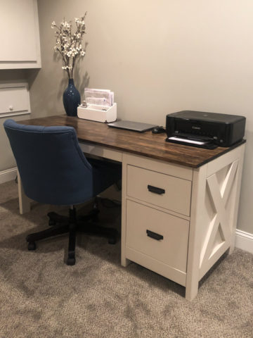 farmhouse desk in office with blue chair