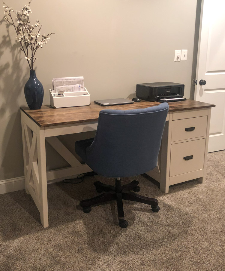 farmhouse desk in office with blue chair