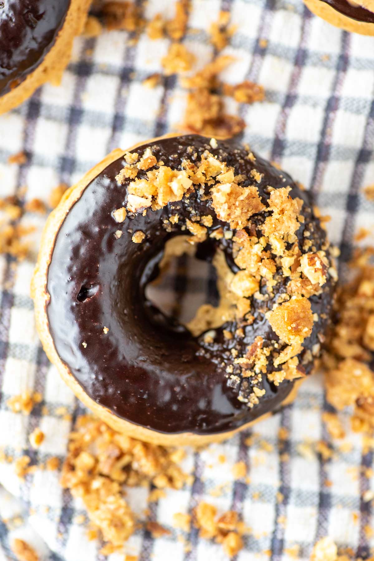 overhead shot of almond butter donuts with mocha glaze and almond streusel