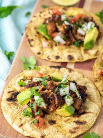 grilled chicken tacos on cutting board