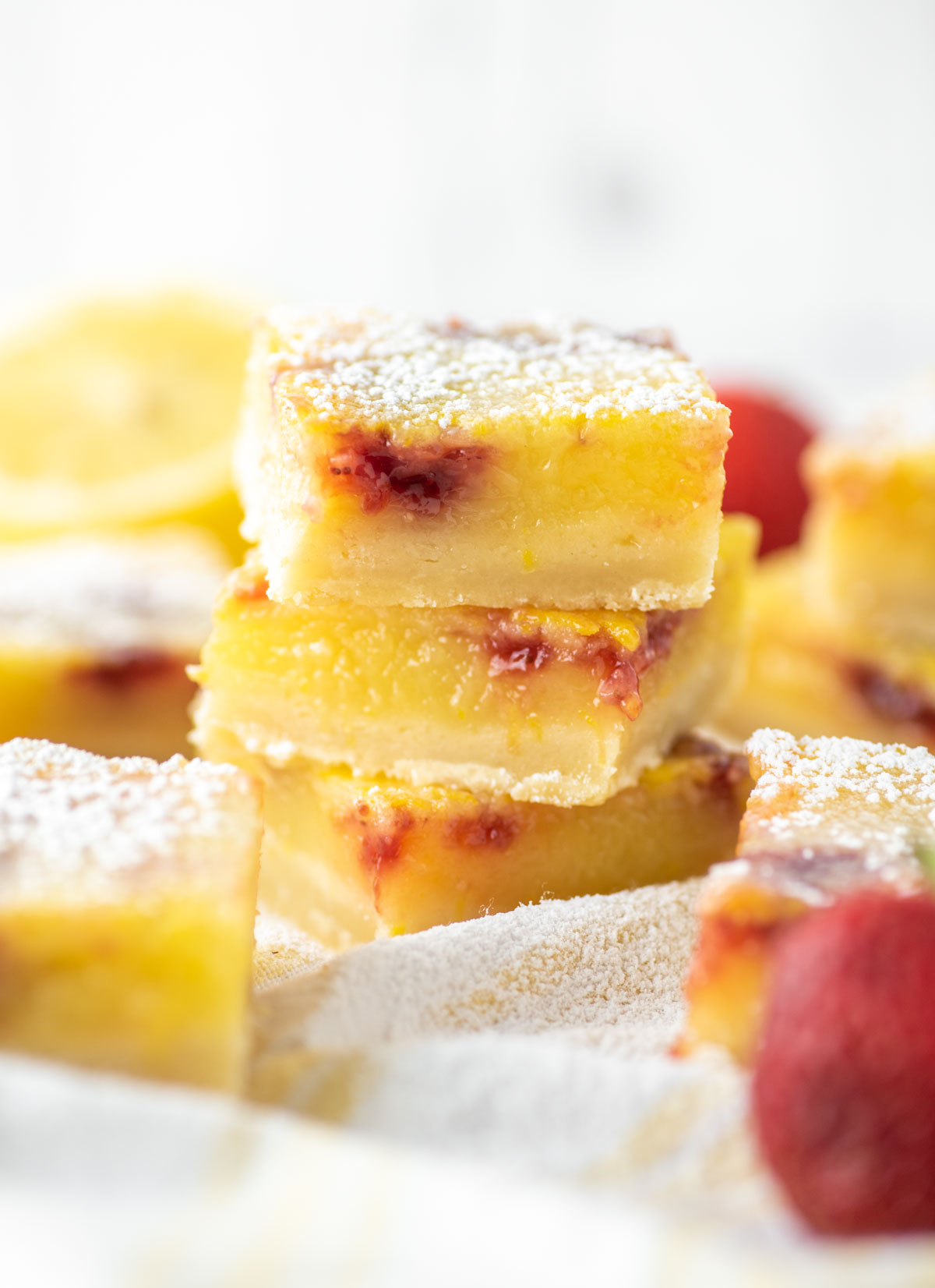 3 strawberry lemon bars stacked on top of each other