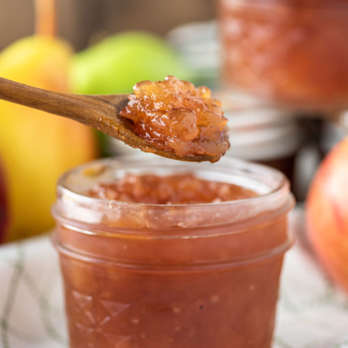 spoon dipped in apple and pear jam