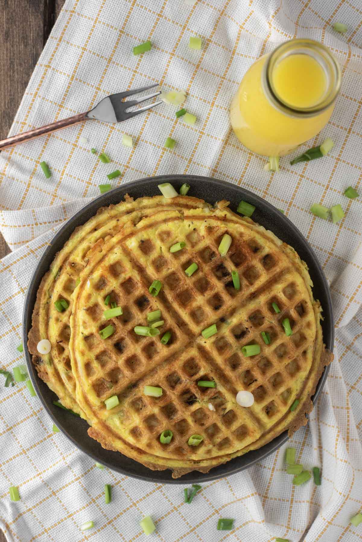 overhead shot of hash brown waffles on plate