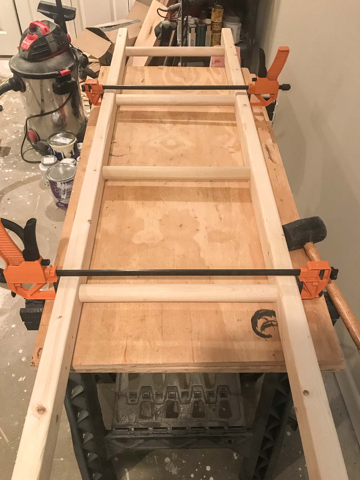 gluing and clamping diy blanket ladder