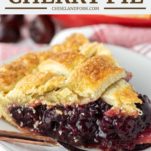 slice of homemade cherry pie on white plate with fork