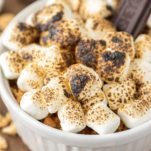 s'mores crème brûlée in white ramekin that is torched