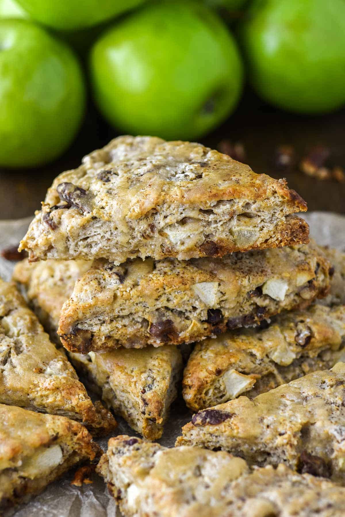 scones with apples and pecans stacked on top of each other