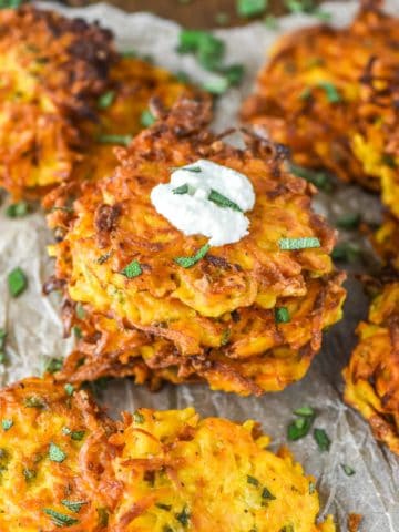 butternut squash fritters stacked with some goat cheese on top