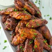 honey BBQ chicken wings on white plate