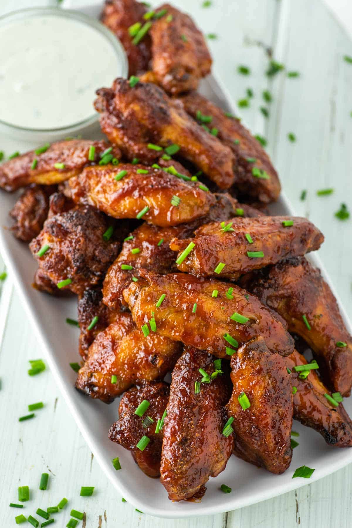 honey BBQ chicken wings on white plate