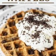 Oreo waffle with whipped cream on white plate