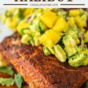 halibut topped with avocado mango salsa on plate