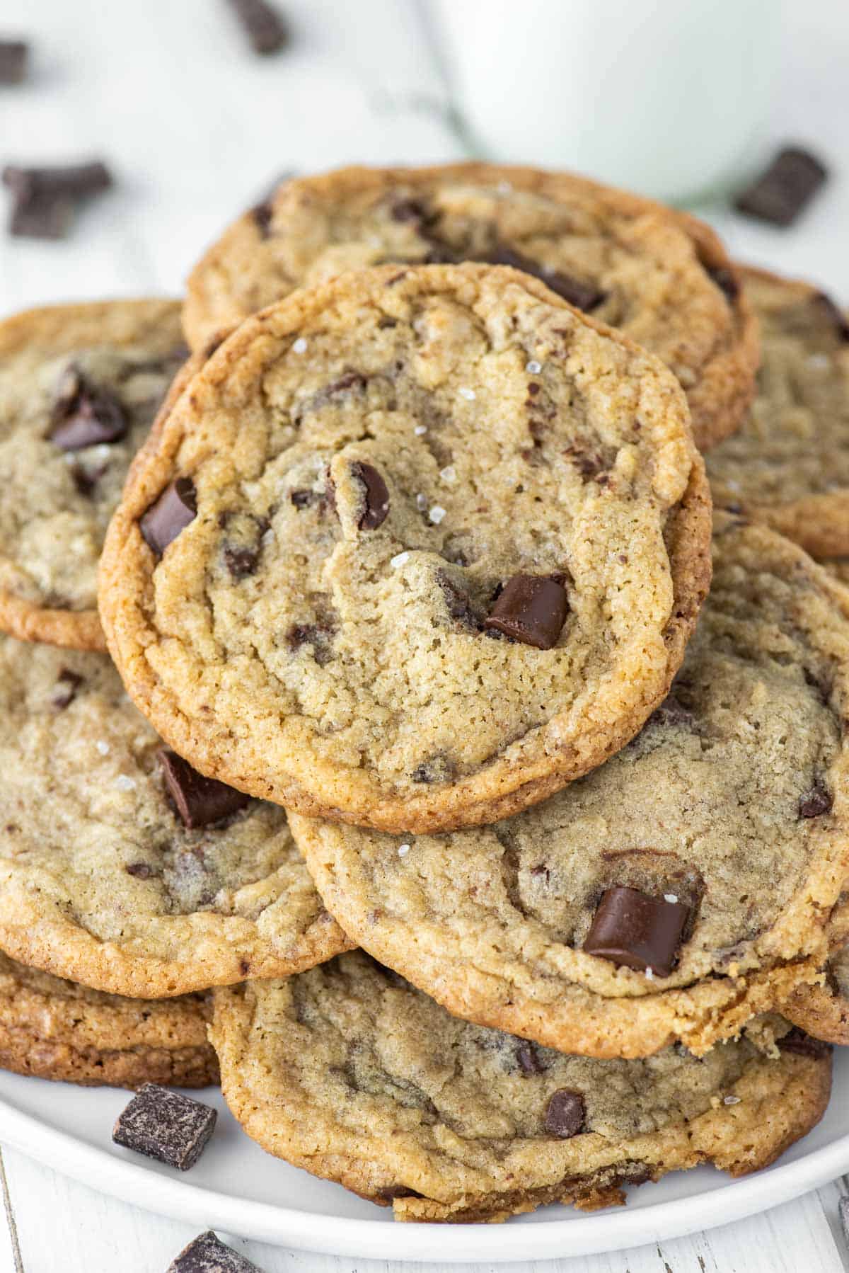 stacked eggless chocolate chip cookies on plate