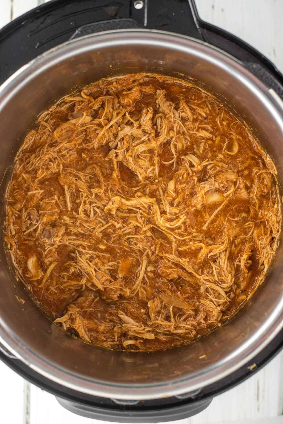overhead shot of pulled BBQ chicken in Instant Pot