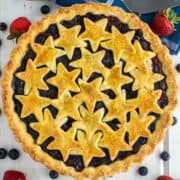 overhead shot of strawberry blueberry pie in pie plate