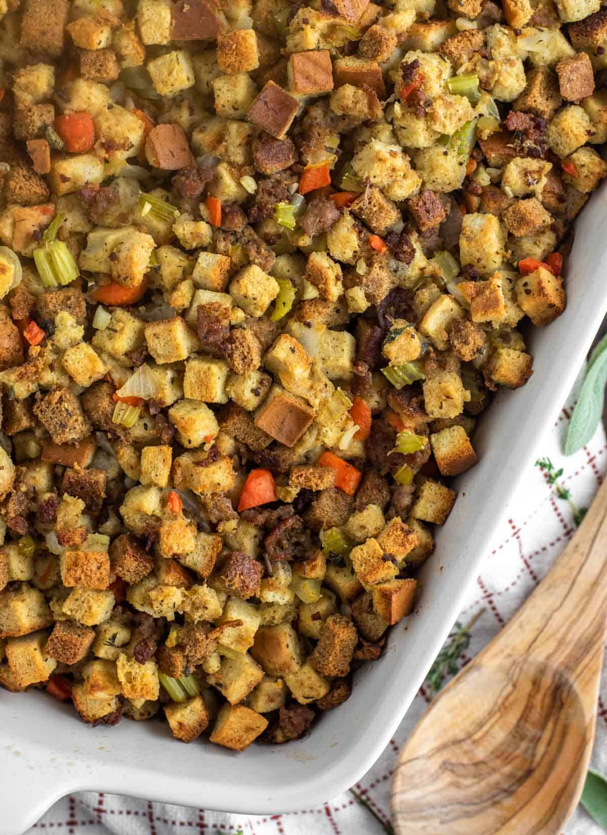 overhead shot of bread stuffing in white dish