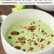 close-up of broccoli almond soup in white bowl