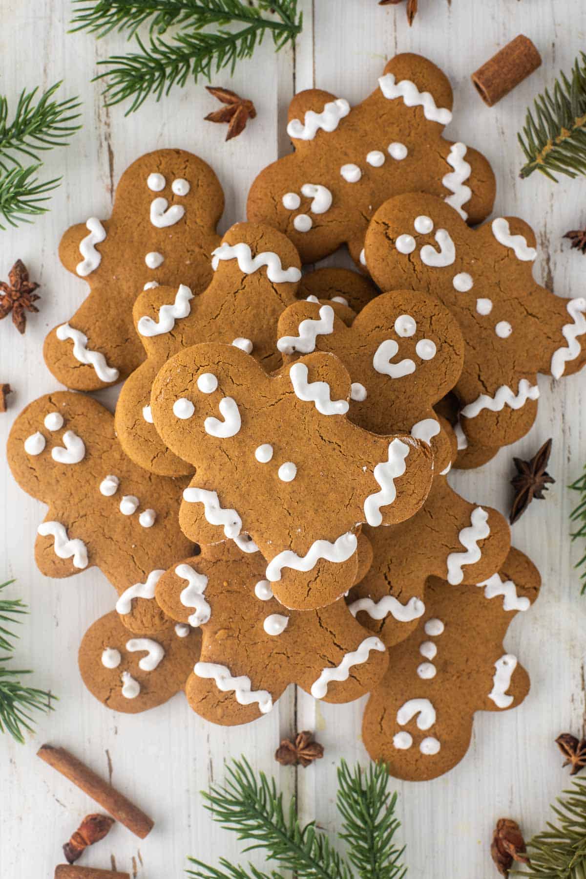 overhead shot of gingerbread men cookies stacked on top of each other