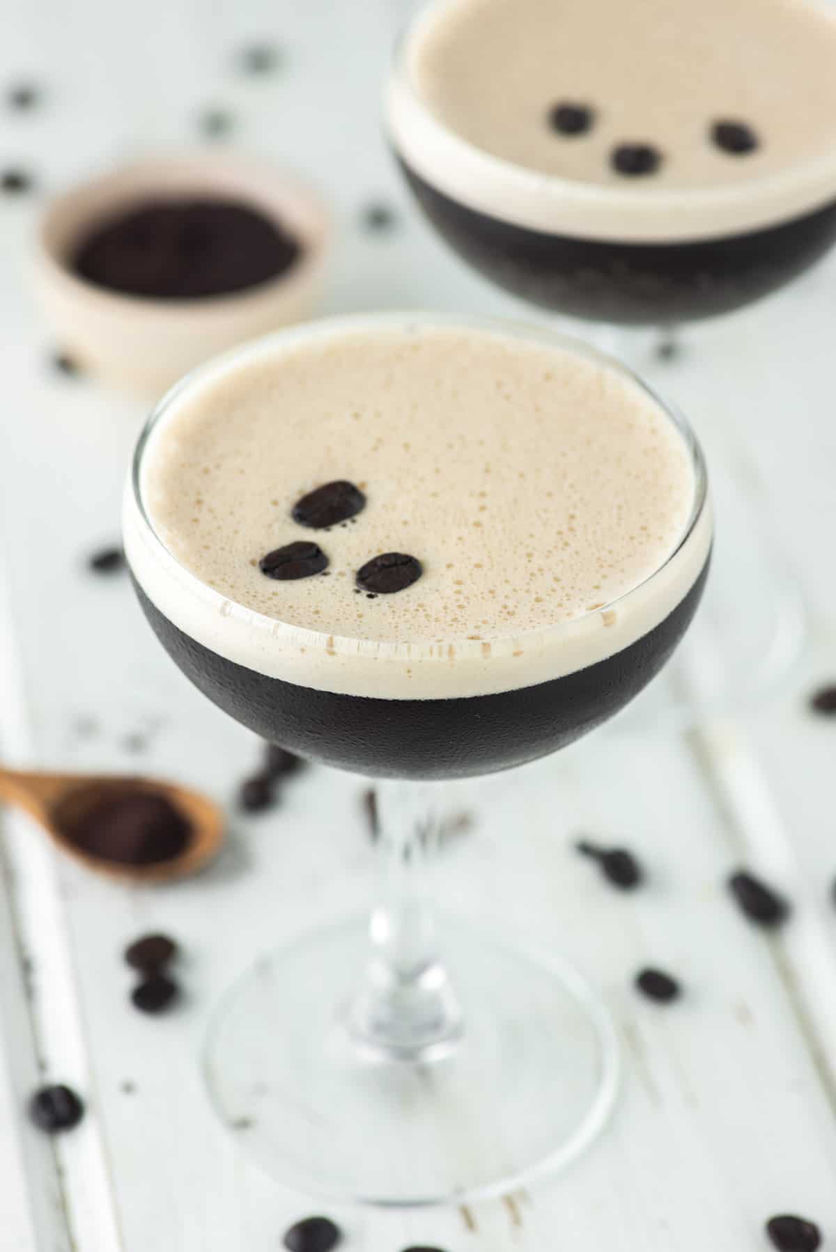two glasses of espresso martinis made with gin