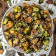 overhead shot of roasted potatoes and broccoli on plate